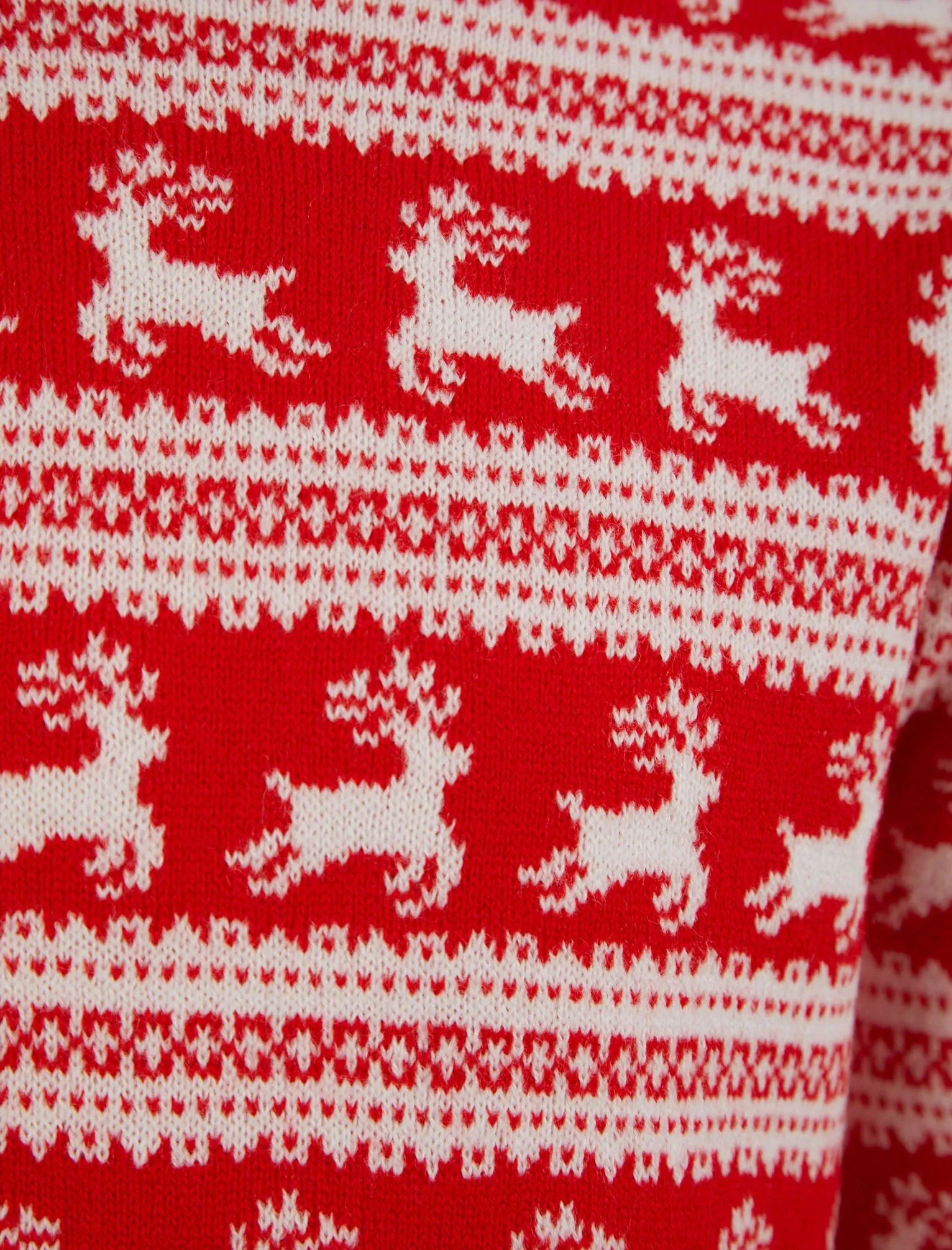 Girl’s Leaping Reindeers Wallpaper Print Novelty Christmas Jumper in High Risk Red - Merry Christmas Kids (4-12yrs)